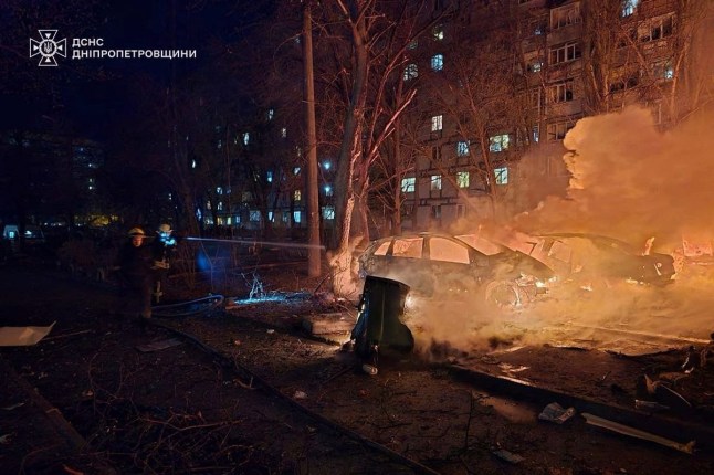 Rescuers work at a site of a Russian drone strike, amid Russia's attack on Ukraine, in Dnipro, Ukraine in this handout picture released April 9, 2025. Press service of the State Emergency Service of Ukraine in Dnipropetrovsk region/Handout via REUTERS ATTENTION EDITORS - THIS IMAGE HAS BEEN SUPPLIED BY A THIRD PARTY. WATERMARK FROM SOURCE.