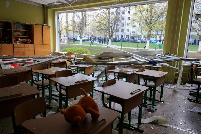 epaselect epa12038469 A damaged class-room of a school near the site of a rocket attack in a residential area in Kharkiv, Ukraine, 18 April 2025, amid the ongoing Russian invasion. At least one person died, and more than 80 others were injured, including six children, according to the State Emergency Service. EPA/SERGEY KOZLOV