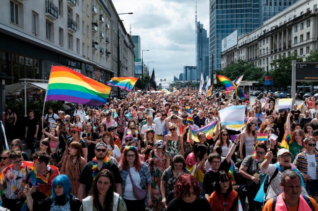 People take part in the Warsaw Equality Parade in Warsaw, Poland, on June 22, 2024. (Photo by Piotr Lapinski/NurPhoto via Getty Images)