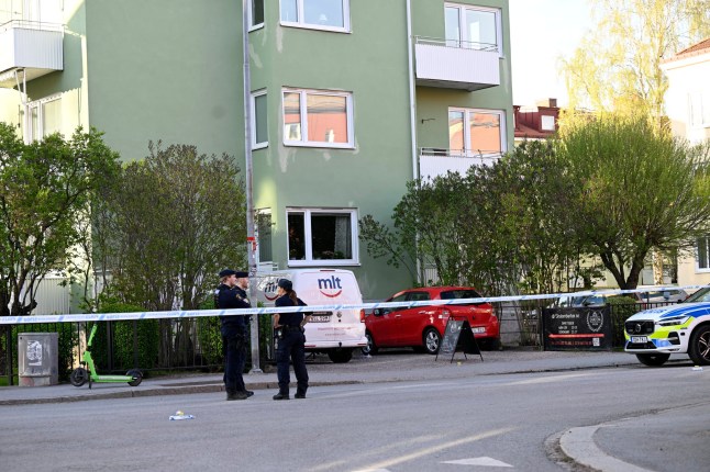 epa12063112 Police at the scene after a suspected shooting at Vaksala Square in Uppsala, Sweden, 29 April 2025. According to police, several people were found with injuries that indicate gunshot wounds. EPA/FREDRIK SANDBERG SWEDEN OUT