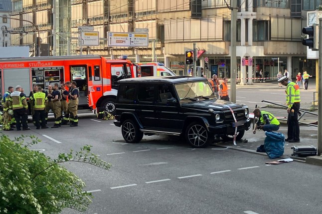 Police work at the scene where a vehicle collided into a group of people in Stuttgart, Germany, on Friday, May 2, 2025. (Marco Krefting/dpa via AP)